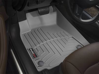 WeatherTech Front FloorLiner Over the hump, Fits vehicles with two retention posts on the driver's side floor, does not fit vehicles with center consoles or floor-mounted shifters Grey 2011 - 2014 Ford F-150 462951